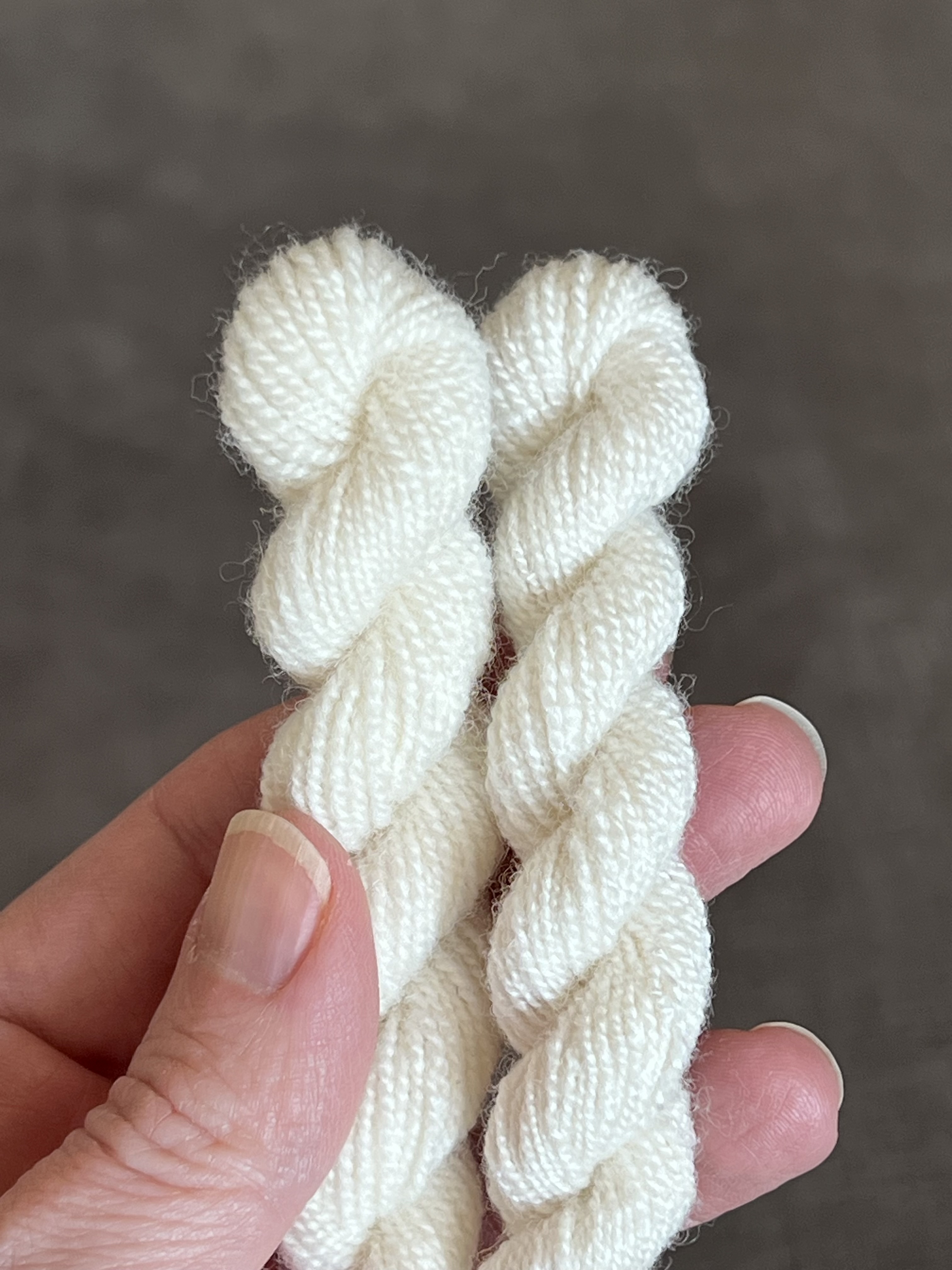 100% Polwarth (left) and 75/25% Polwarth-Bombyx Silk blend (right) sample comparison.